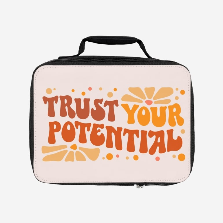 A mockup image of a personalized lunch bag with a curvy text print.