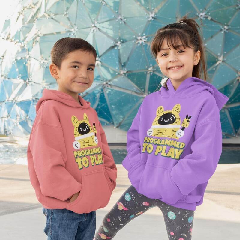 Children wearing custom hoodies with gaming-related graphic design in bright red and purple.