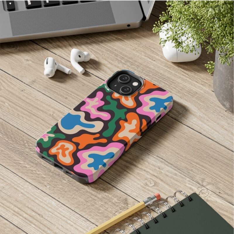 Print On Demand With Shopify Phone Accessories A custom phone case with a colorful abstract design.