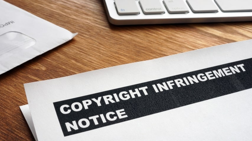 A piece of paper with “Copyright infringement notice” written on it.