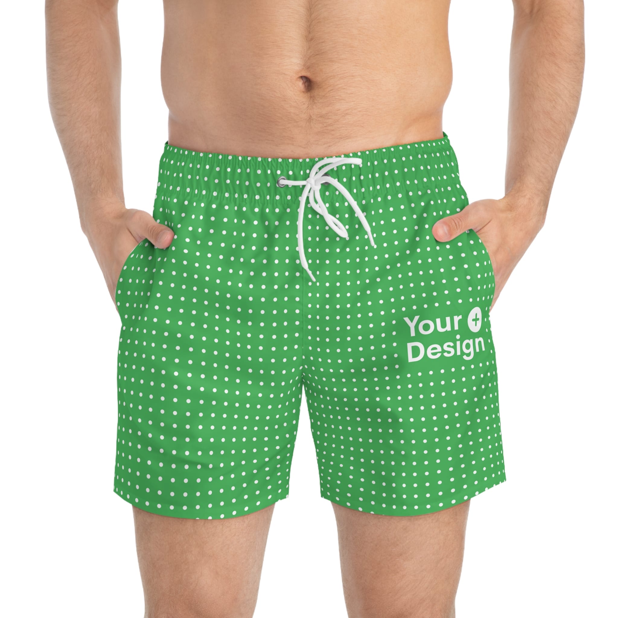A man with green dotted swimming briefs on and “Your Design+” logo.