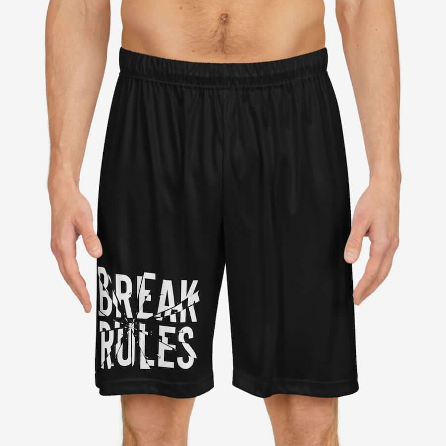 Black basketball shorts with the text: “Break Rules.”