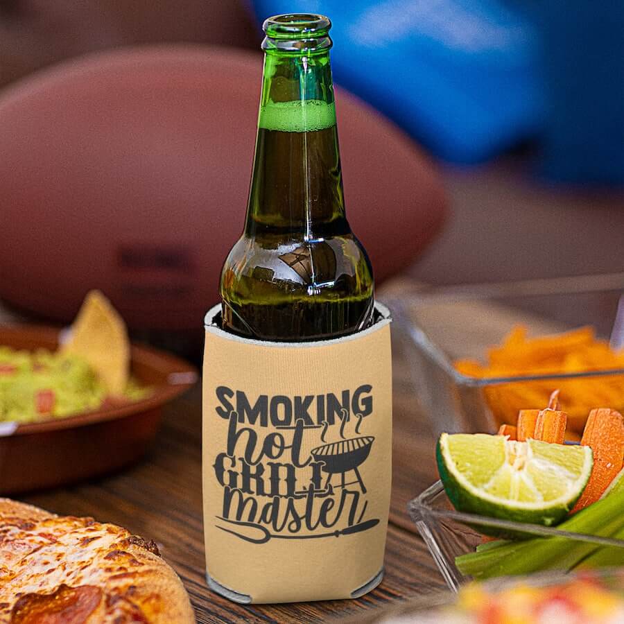 A yellow can cooler with a stylized grill and the text: “Smoking Hot Grill Master.”