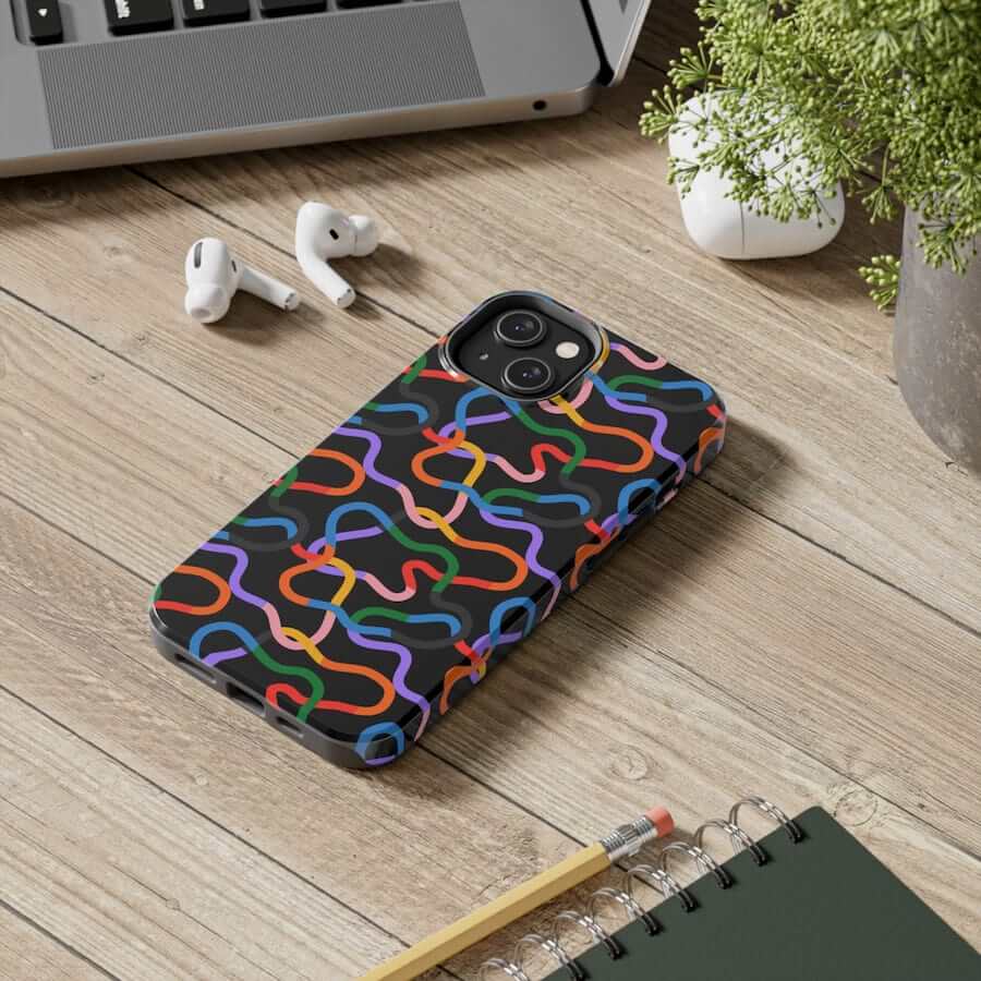 A phone case with an abstract, colorful design.