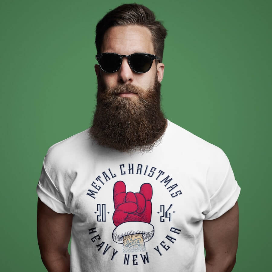 A bearded man with sunglasses wearing a cool t-shirt with the text: “Metal Christmas.”