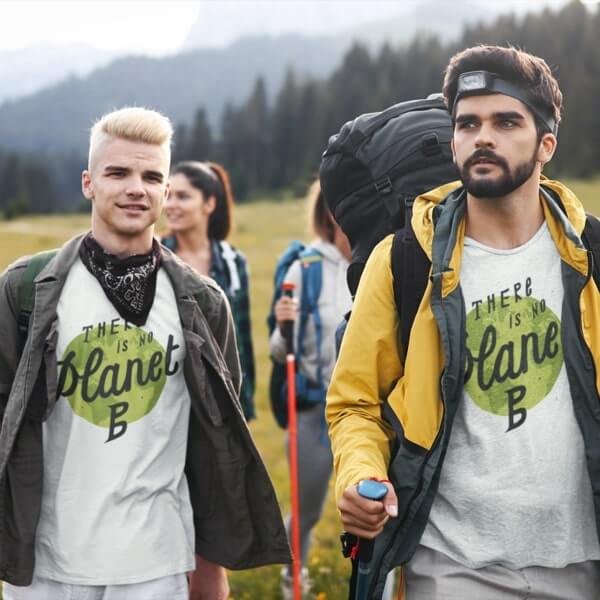 Two men wearing matching shirts with the text “There is no Planet B” and an image of a green globe on them.