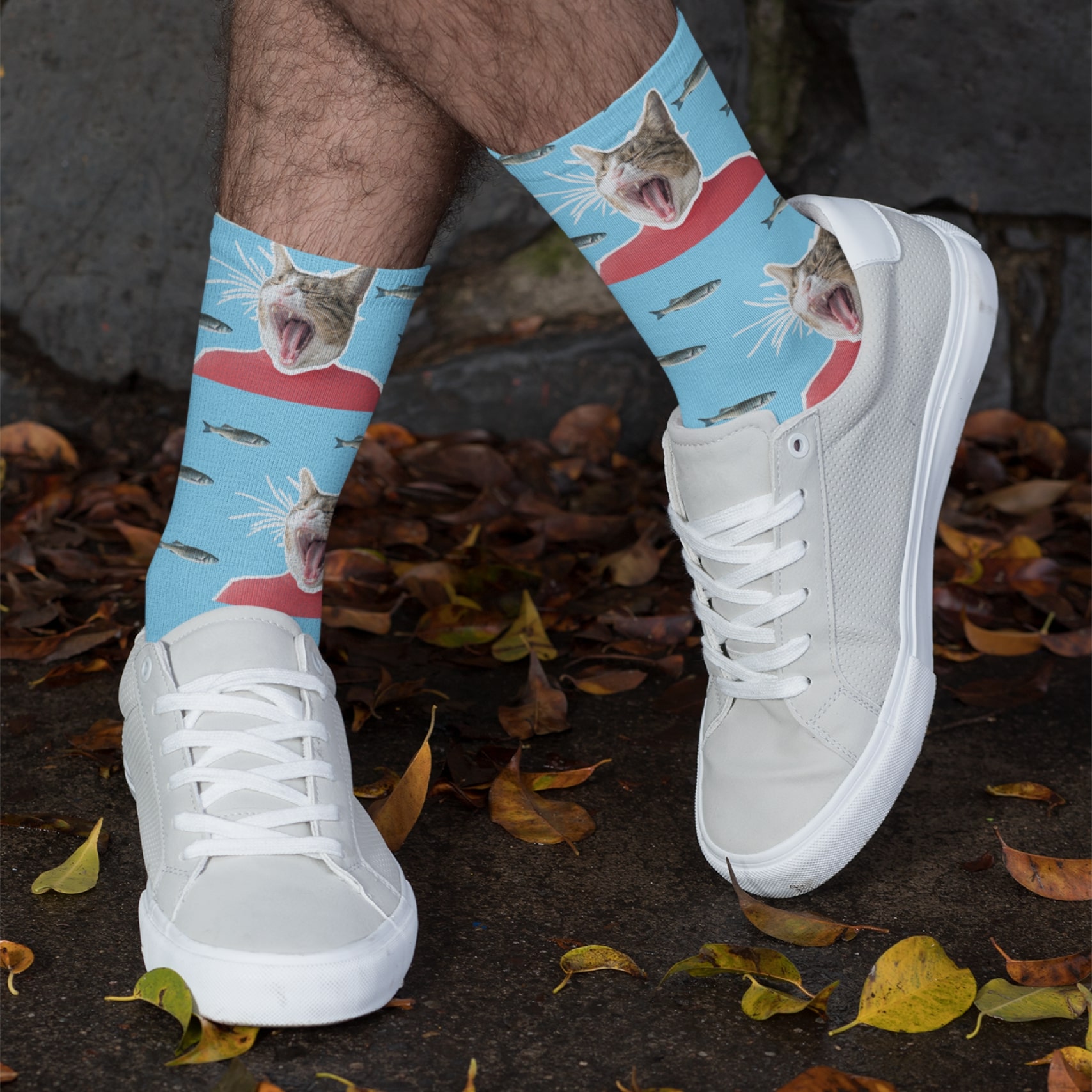 Custom socks in blue with a cat print.