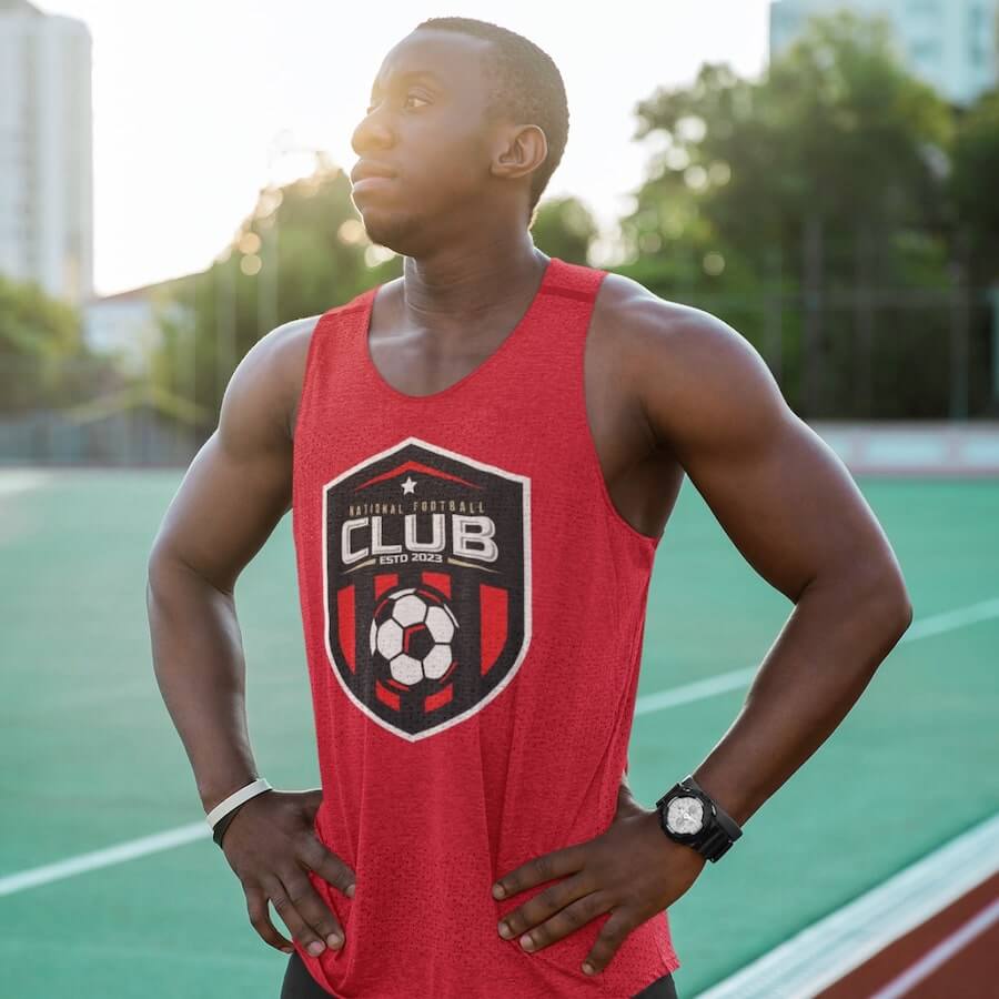 A muscular man wearing a red tank top with his team logo and the text “National Football Club.”