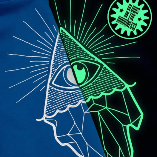 A glow-in-the-dark hoodie with a one-eyed pyramid design.