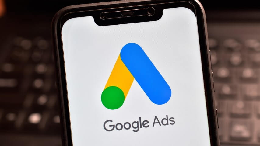 A phone with the Google Ads logo on its screen.