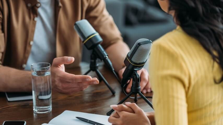 A picture of a podcast being recorded as a channel of driving traffic to a Shopify store.