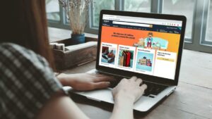 A woman researching Amazon SEO tips and tricks for her online store.