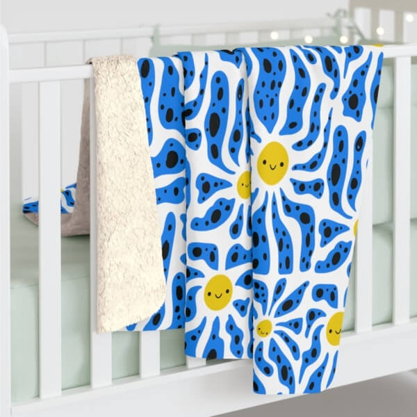 A custom Sherpa fleece blanket with an abstract floral print.