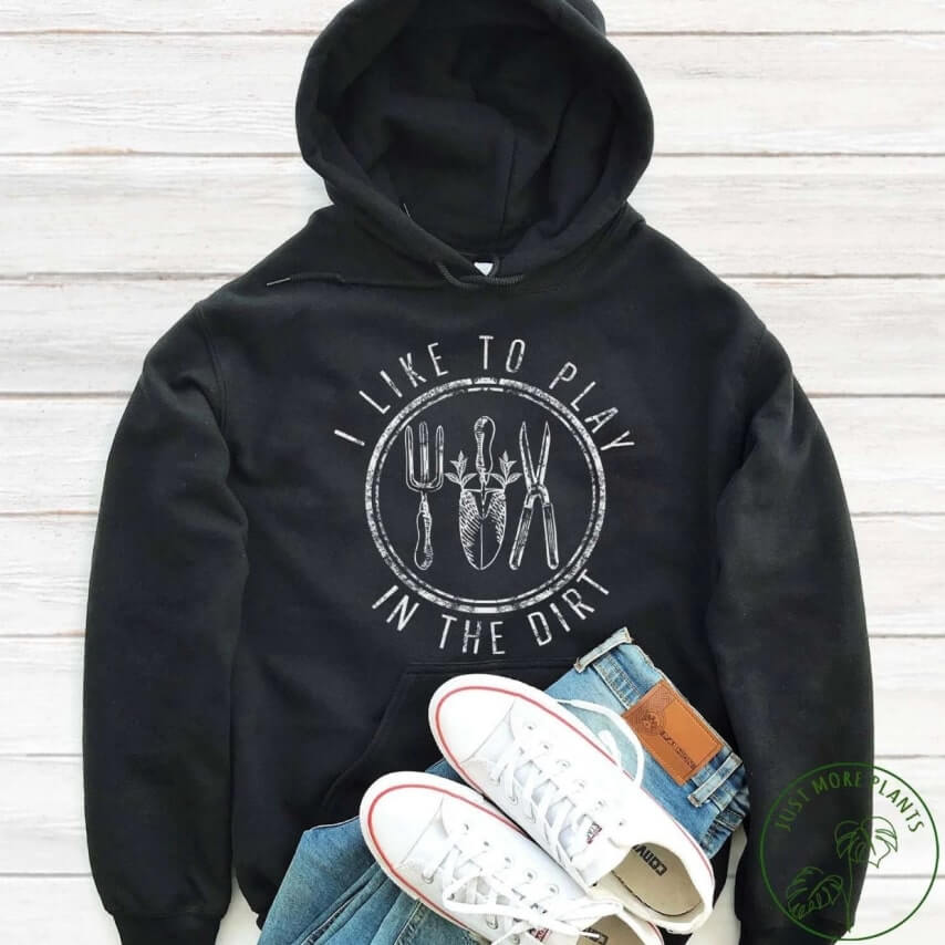 A clever gardening-themed hoodie design that says "I like to play in the dirt."