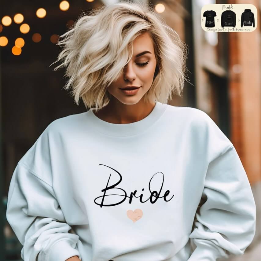 A woman rocking a cute sweatshirt that says "Bride."