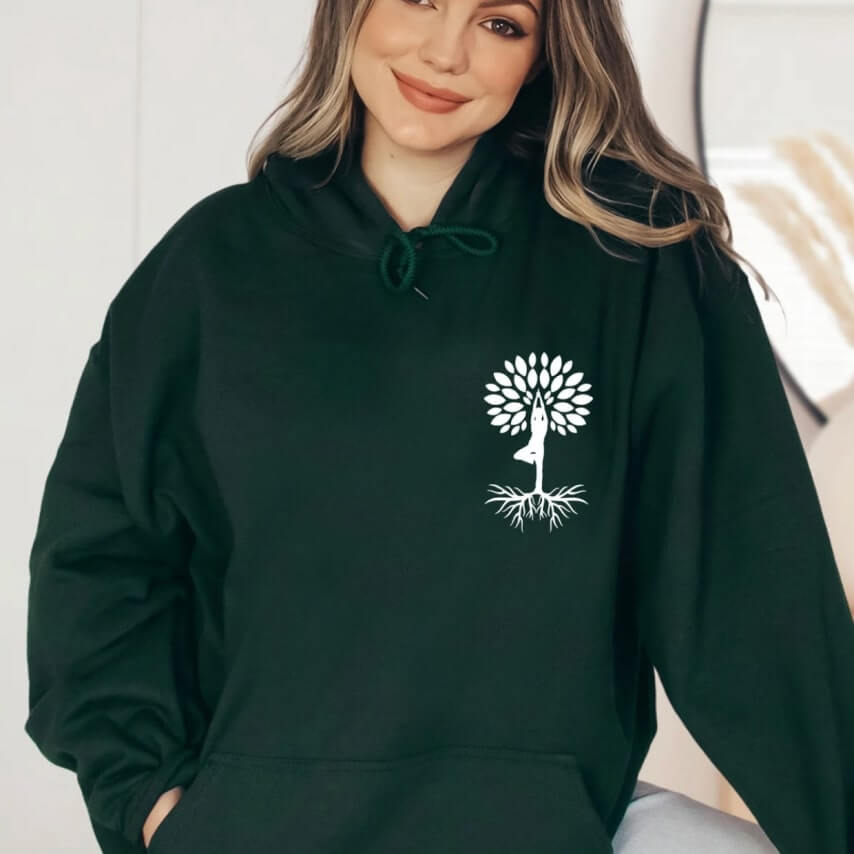 A yoga-themed hoodie design with a person holding a yoga pose in the shape of a tree.