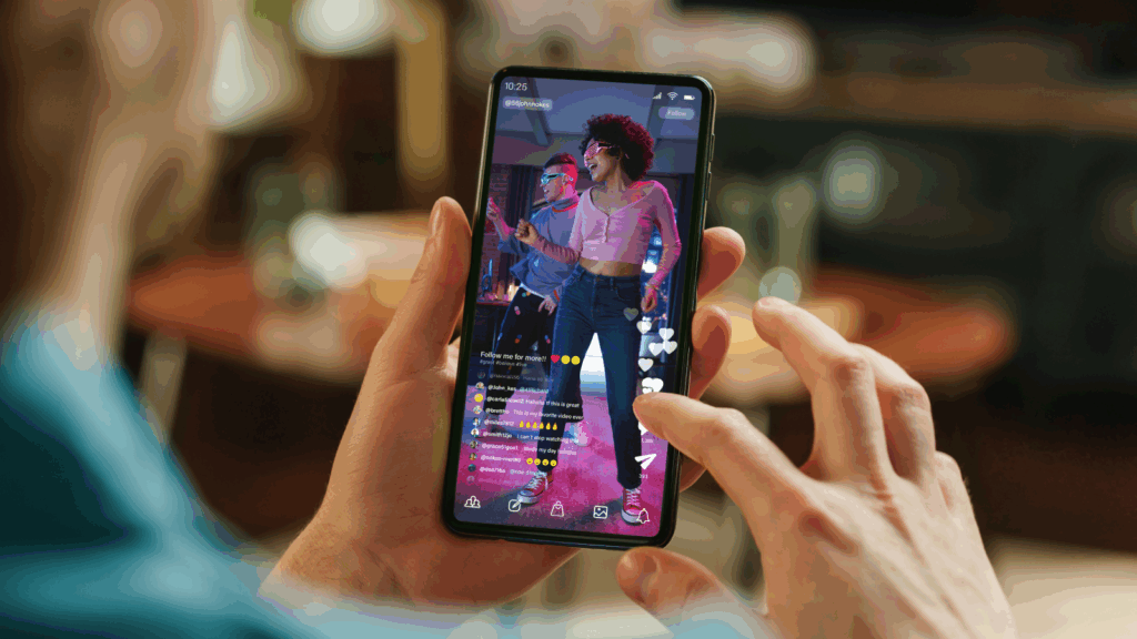 Follow trends A person watching TikTok on a phone.