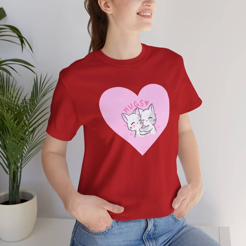 A custom red t-shirt with a cat-themed Valentine’s Day print in front.