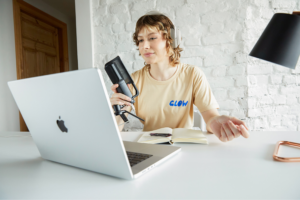 A woman learning how to start a print-on-demand business.
