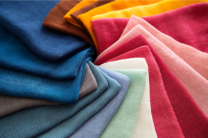 Samples of cotton fabric in various colors.