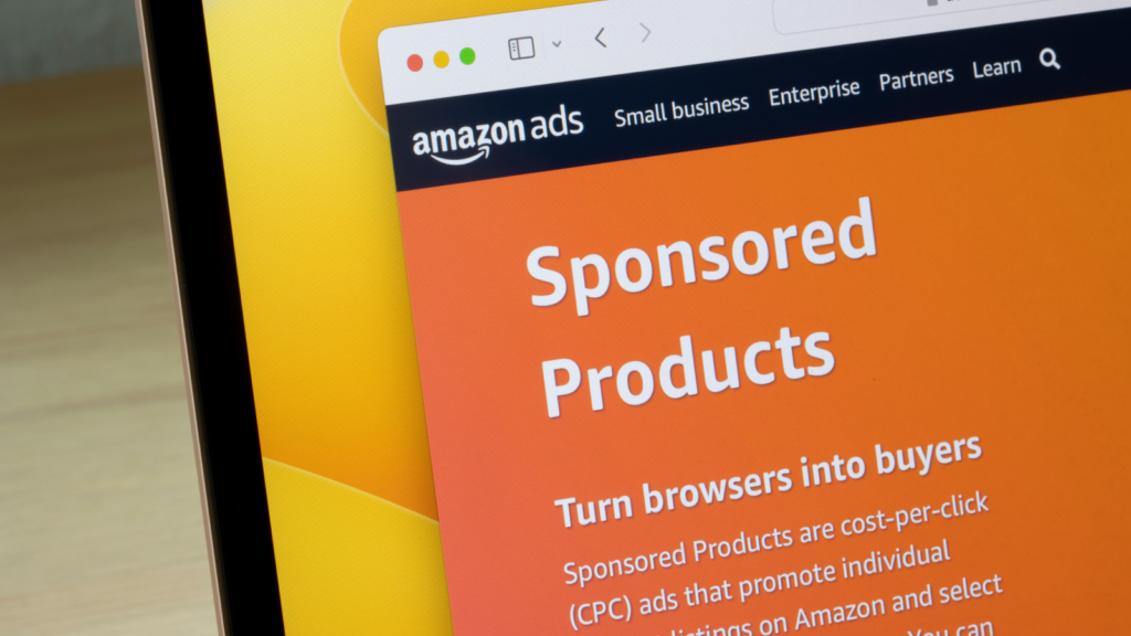 How to market your Amazon storefront A picture of a laptop’s screen corner, with the Amazon Ads page on the screen.
