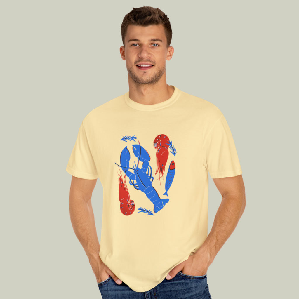 Red blue and yellow A man wearing a red, blue, and yellow custom t-shirt on a light olive green background.