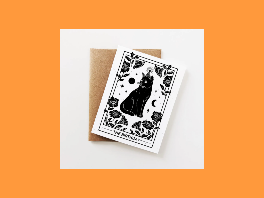 Tarot inspired birthday designs A greeting card with a black cat illustration on it.