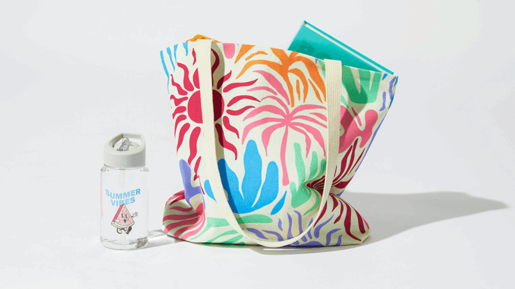 All over print tote bag High margin products A colorful bag containing a bottle and a water bottle, showcasing vibrant patterns and practical design.