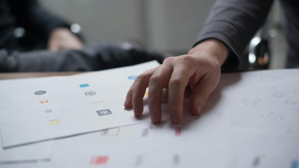 Branding Shopify store names A person developing branding elements.