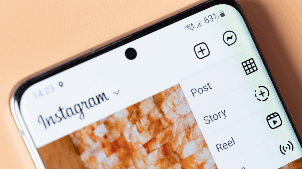 Drive traffic and sales with Instagram marketing A close-up shot of a mobile phone with the Instagram app open.