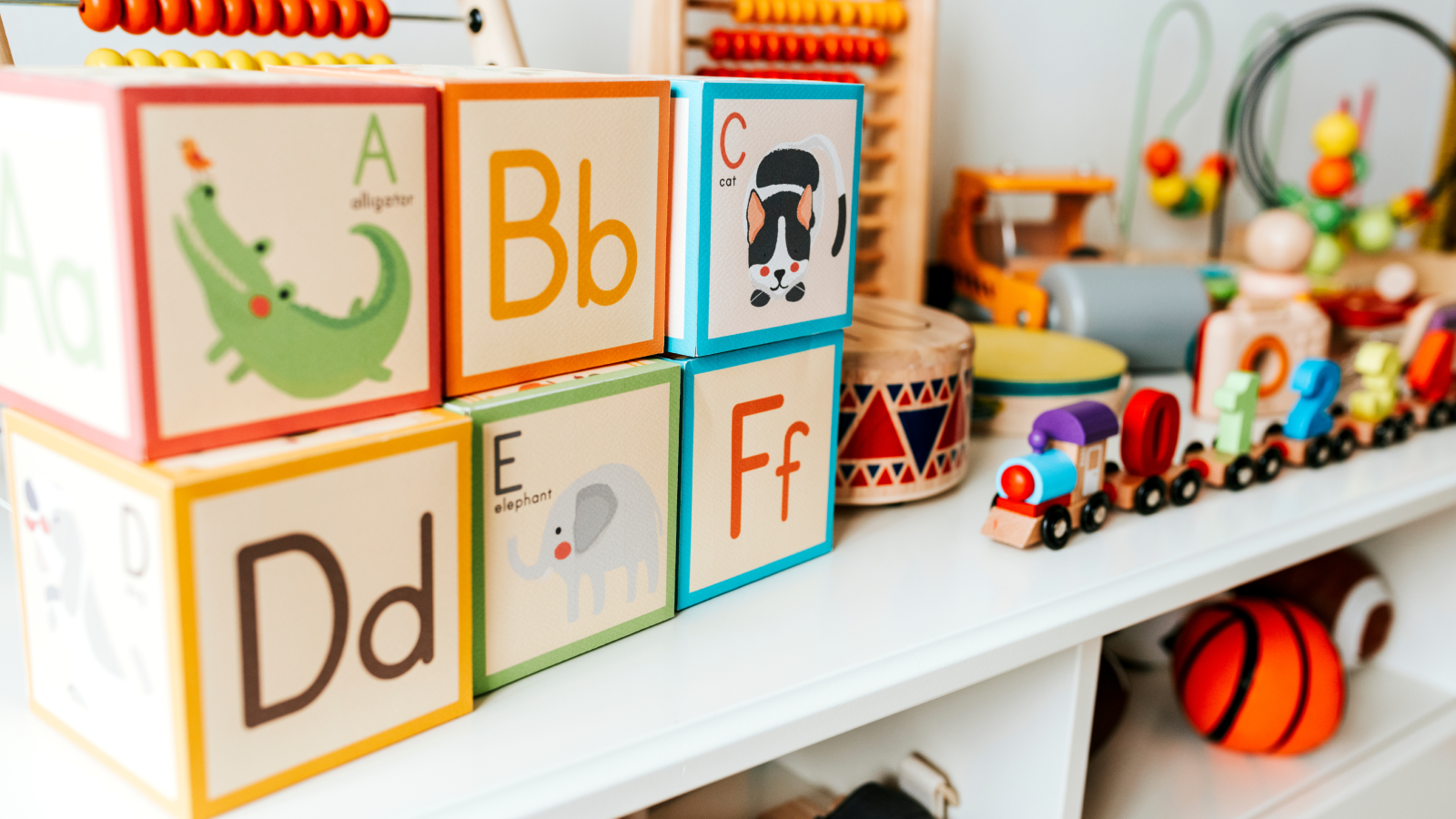 Toys and games What to sell on Amazon A shelf of different kids' toys.