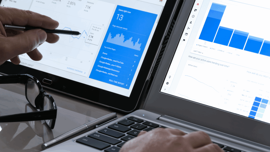 Use advertising tools How to start a dropshipping business A person using various advertising analytics tools to analyse performance.