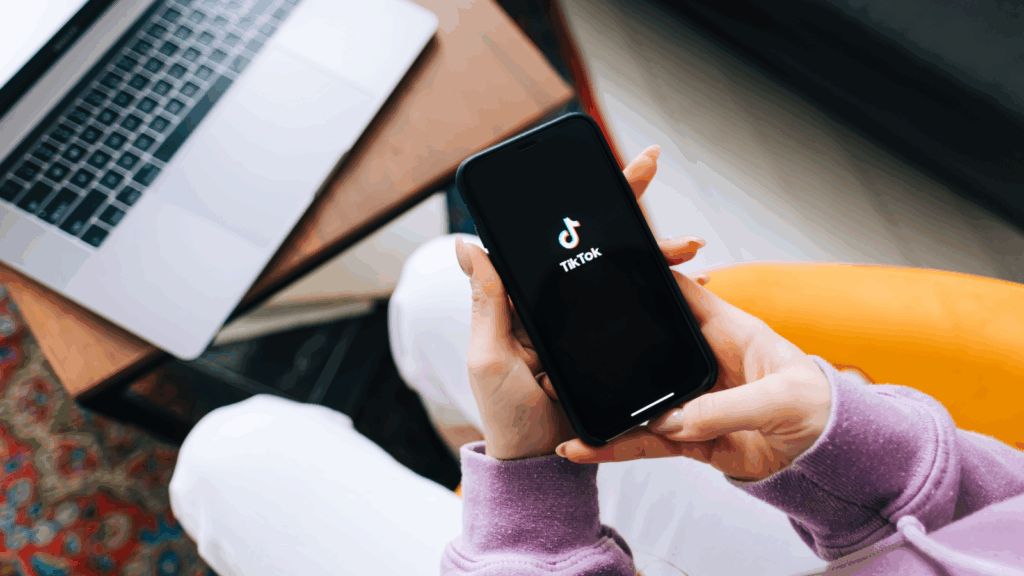 Benefit from TikTok ads TikTok app displayed on a smartphone screen.
