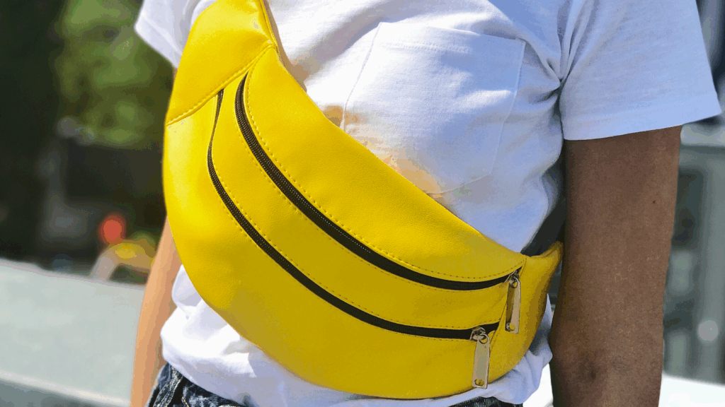 Fanny packs Etsy shop ideas A woman wearing a yellow fanny pack.
