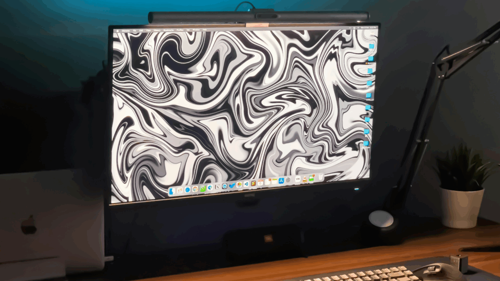 Go digital A monitor with an abstract black and white background.