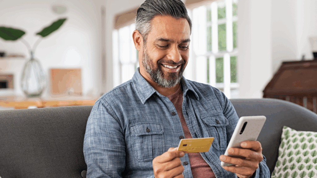 A man making a payment through his phone.