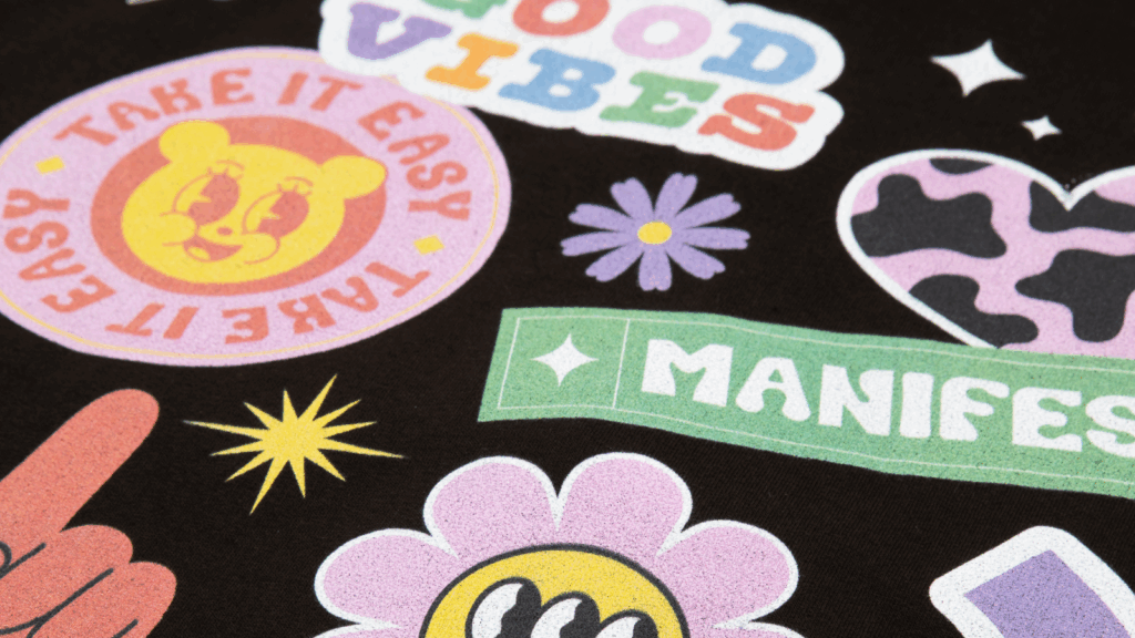 Print results and durability Various illustrations printed on a black t-shirt.