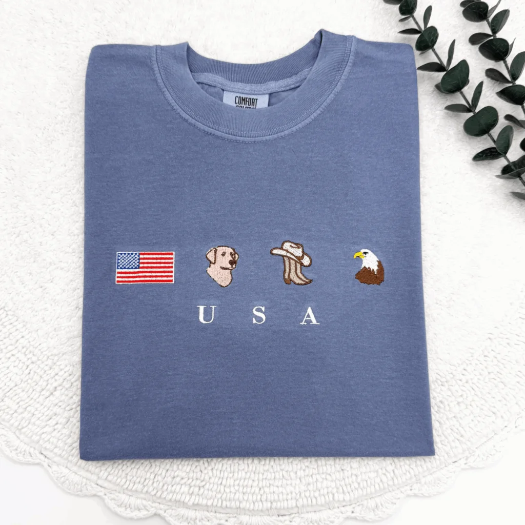 A blue, minimalistic 4th of July-themed t-shirt.