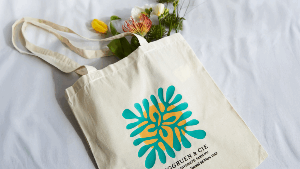 Totebag Make a living without a job A tote bag on a white background with a custom print.