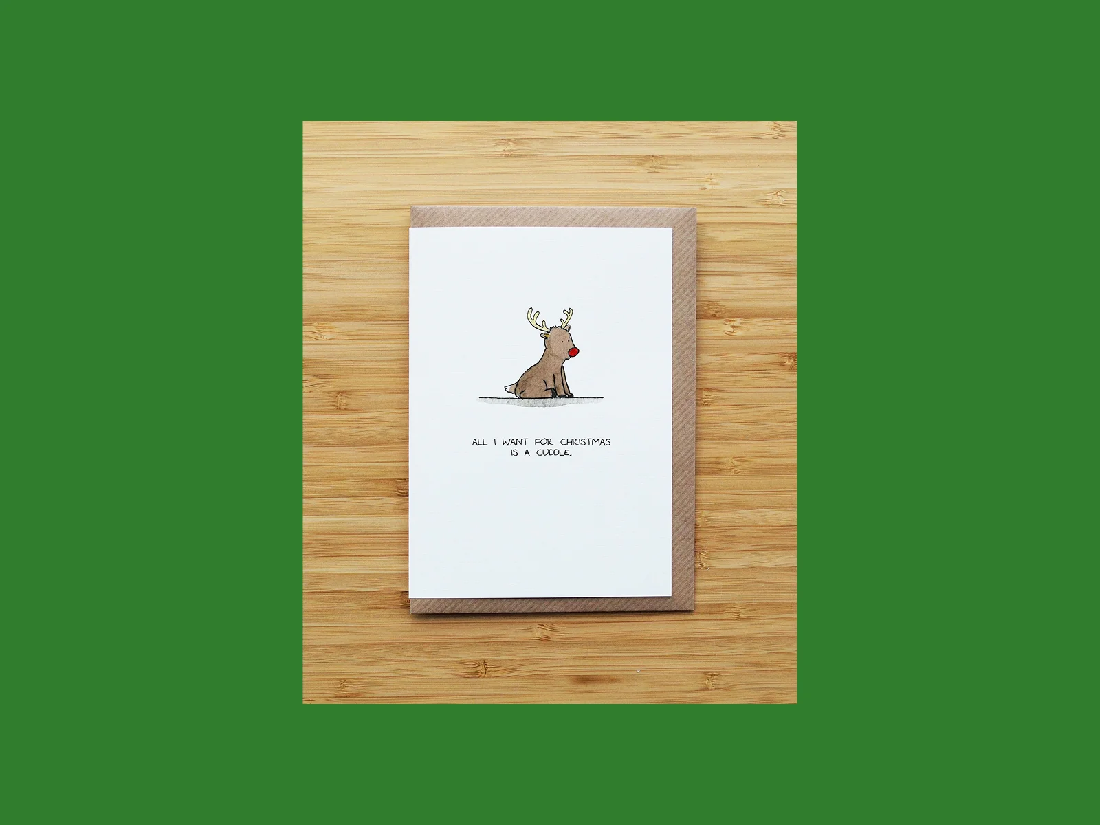 A cute Christmas card with an illustrated deer.