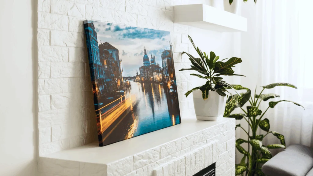 A framed picture of a cityscape is displayed on a wall, showcasing urban buildings and skyline details.