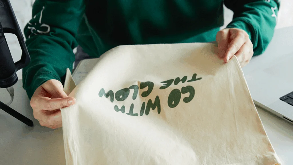 Tote bag with text on it.