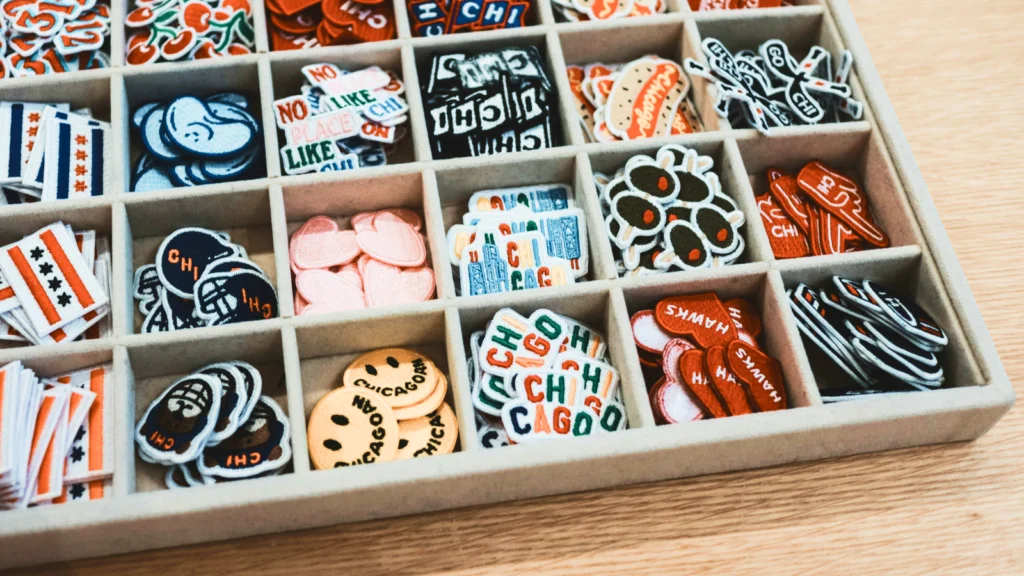 A box full of different patches.