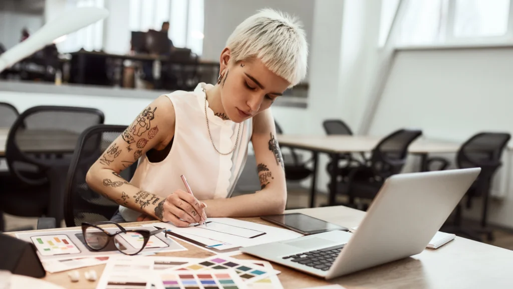A woman is taking notes.