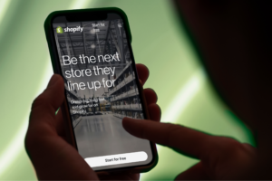 A person is browsing a Shopify landing page on the phone.