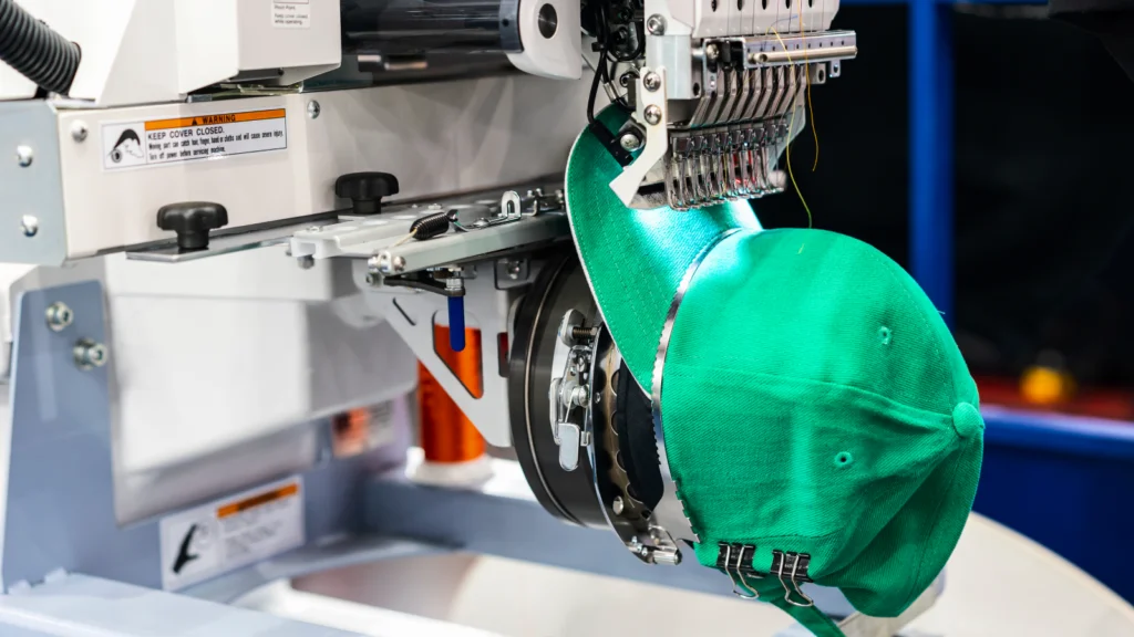 Step by step guide to make custom hats A hat is being embroidered.