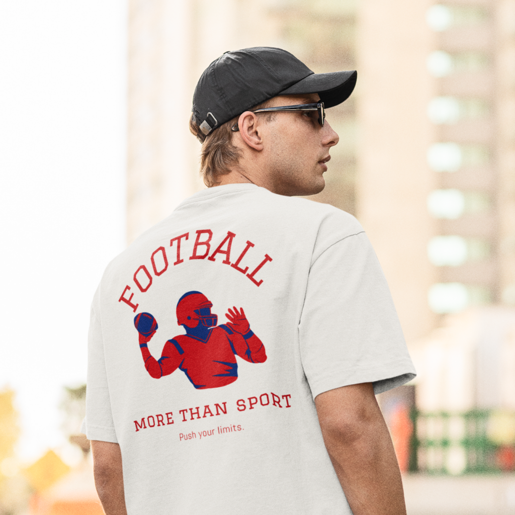 02 Retro style Super Bowl shirt design Man wearing a white t-shirt with a red-blue football player graphic and phrases "Football", "More than sport", and "Push your limits".