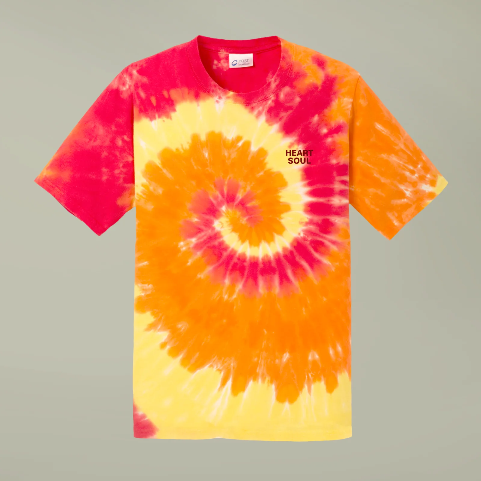 Tie-dye T-shirt with vibrant orange, pink, and yellow spiral design. Features the text "Heart Soul" on the chest, conveying a lively, retro vibe.