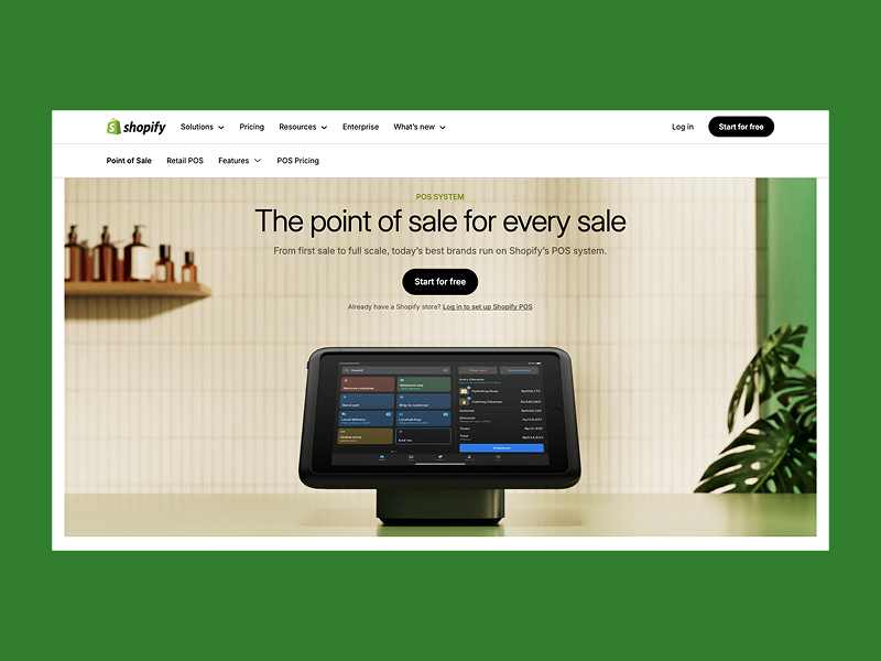 Shopify POS web page displaying a tablet with a point-of-sale interface.