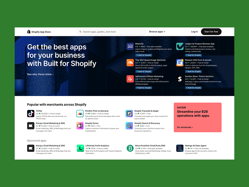 Shopify App Store homepage with a search bar at the top. Features apps for business, popular app section, and a highlighted B2B promotion in red.